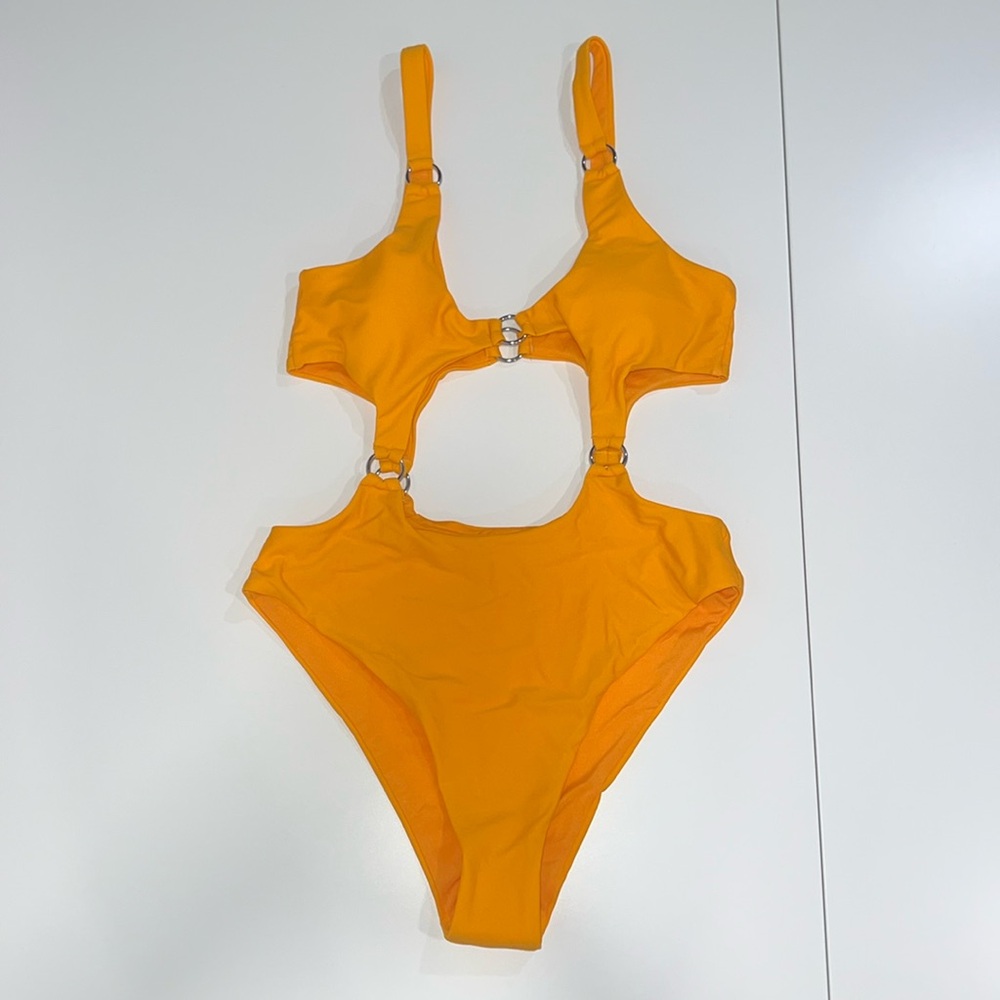 NWOT MATTE collection, one piece sexy bathing suit with cutouts, size medium